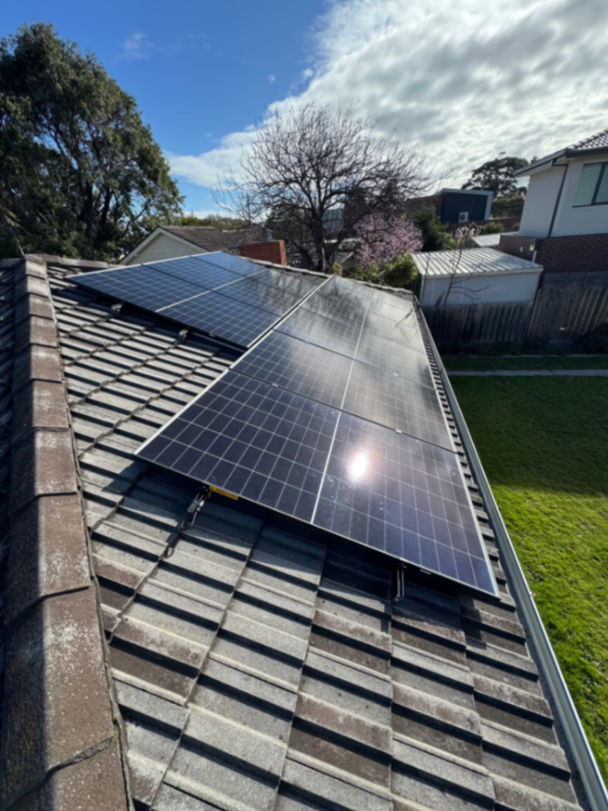 Solar panels installed on residential tiled roof